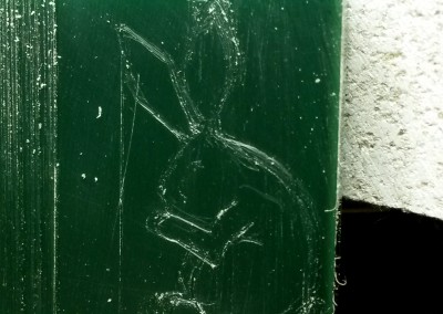 wax carving a rabbit pendant