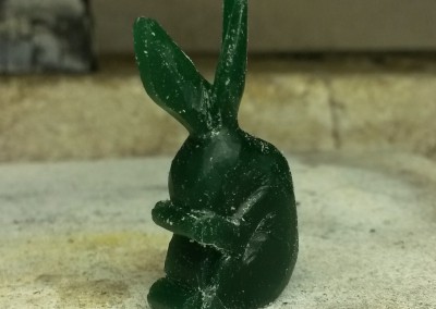 carving a rabbit pendant in wax