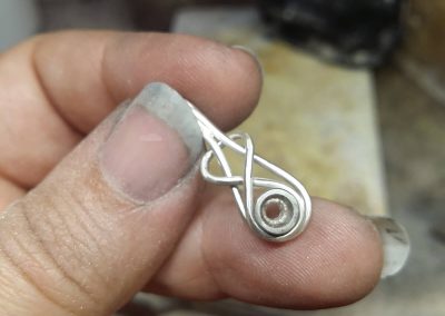 Silver knot pendant ready to solder together