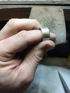 Finishing the ring with a textured filed finish