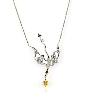 silver and gold dragon pendant